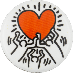 a white pin with Keith Haring's art of three people holding up a red heart